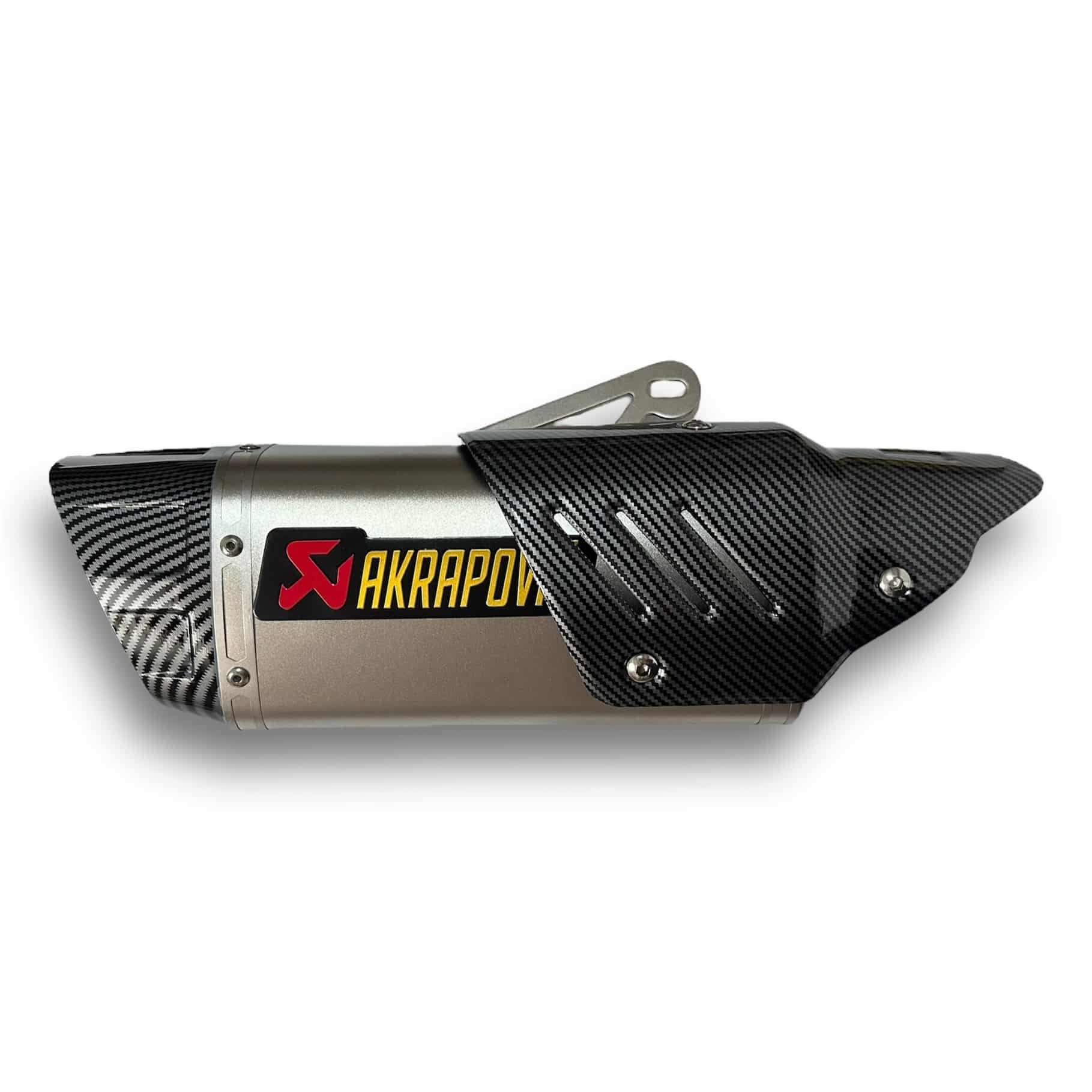 ESCAPE TIPO AKRAPOVIC CON PROTECTOR Y PUNTA DE IMITACIÓN CARBONO 🔥 ¿Para que sirve un escape de moto? Un escape deportivo sirve para que otros conductores puedan notar nuestra presencia en la carretera gracias al sonido perceptible que produce. Además, algunos escapes tienen un diseño deportivo que le da un aspecto más atractivo a la motocicleta. Especificaciones: Largo: 45cm Entrada: 51mm con reductor hasta 35mm Cuenta con: - Pernos y resortes de fijación. - Acople reductor. - DB-Killer (reductor de decibelios)