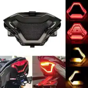 Foco Integrado LED para Yamaha R3, R3A, MT-03, y MT-07 (2013 - 2017) 🔥 Este foco LED ahumado cuenta con 108 luces LED, incluyendo señales de dirección secuenciales, ofreciendo un diseño futurista y deportivo que complementa la estética de las motocicletas. El parpadeo secuencial mejora la visibilidad y asegura mayor atención comparado con las luces tradicionales. Características: Material: 108 perlas SMD de alto brillo, carcasa de plástico ABS de alta resistencia. Fuente de luz: LED. Voltaje de entrada: 12V. Carcasa: Color negro. Lentes: Ahumadas. Impermeabilidad: IPX5. Este foco LED es altamente eficiente, resistente a bajas temperaturas, con bajo consumo de energía, ofreciendo durabilidad y ahorro energético superior. Ideal para mejorar la visibilidad y la apariencia de tu motocicleta. Compatible con: Yamaha R3, R3A, MT-03, MT-07 (2013 - 2017). Conexiones: Negro: Polo negativo. Rojo: Luces de conducción. Verde: Luz de freno (intermitente continuo). Azul: Señal de giro izquierda. Azul: Señal de giro derecha.