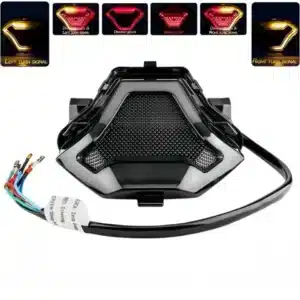 Foco Integrado LED para Yamaha R3, R3A, MT-03, y MT-07 (2013 - 2017) 🔥 Este foco LED ahumado cuenta con 108 luces LED, incluyendo señales de dirección secuenciales, ofreciendo un diseño futurista y deportivo que complementa la estética de las motocicletas. El parpadeo secuencial mejora la visibilidad y asegura mayor atención comparado con las luces tradicionales. Características: Material: 108 perlas SMD de alto brillo, carcasa de plástico ABS de alta resistencia. Fuente de luz: LED. Voltaje de entrada: 12V. Carcasa: Color negro. Lentes: Ahumadas. Impermeabilidad: IPX5. Este foco LED es altamente eficiente, resistente a bajas temperaturas, con bajo consumo de energía, ofreciendo durabilidad y ahorro energético superior. Ideal para mejorar la visibilidad y la apariencia de tu motocicleta. Compatible con: Yamaha R3, R3A, MT-03, MT-07 (2013 - 2017). Conexiones: Negro: Polo negativo. Rojo: Luces de conducción. Verde: Luz de freno (intermitente continuo). Azul: Señal de giro izquierda. Azul: Señal de giro derecha.
